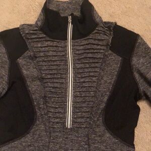 Lulu lemon women’s zip up sports sweater.